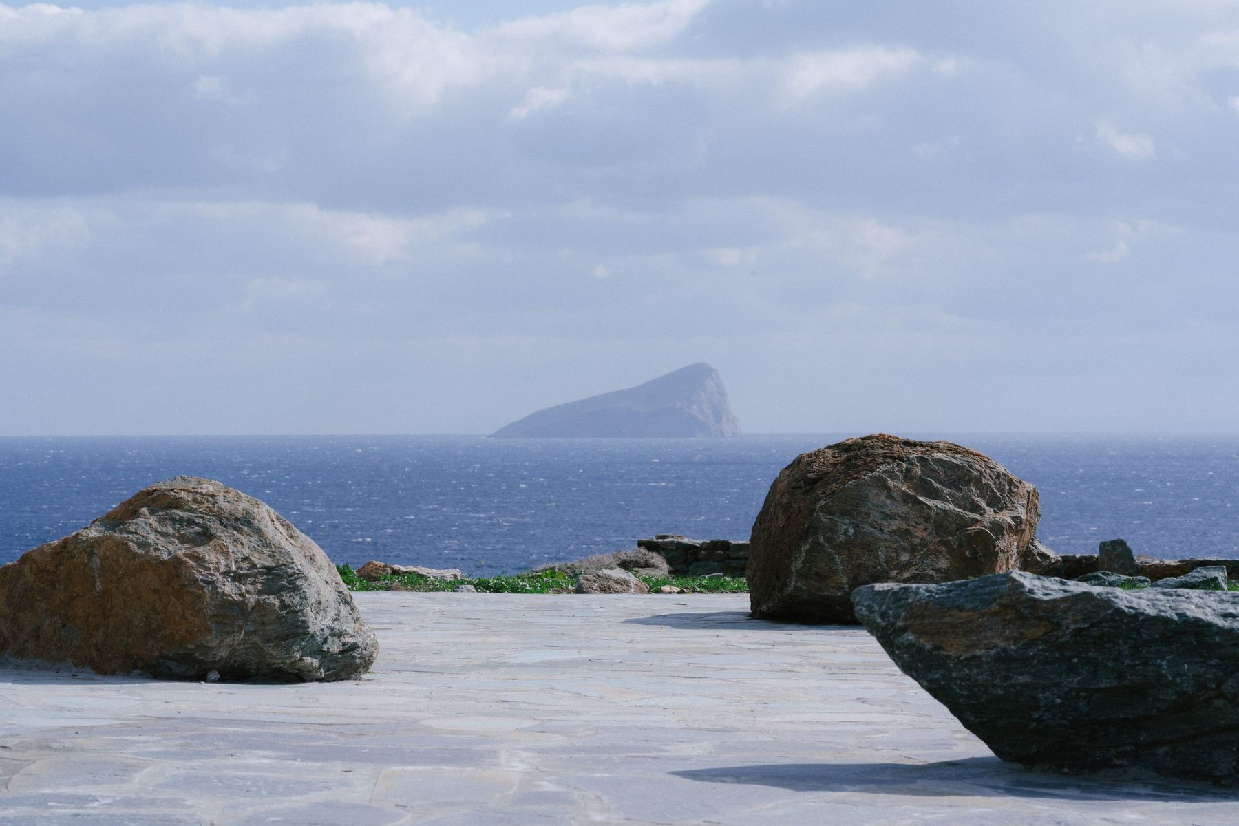 Stone terrace overlooking the Aegean, Kythnos island in the distance